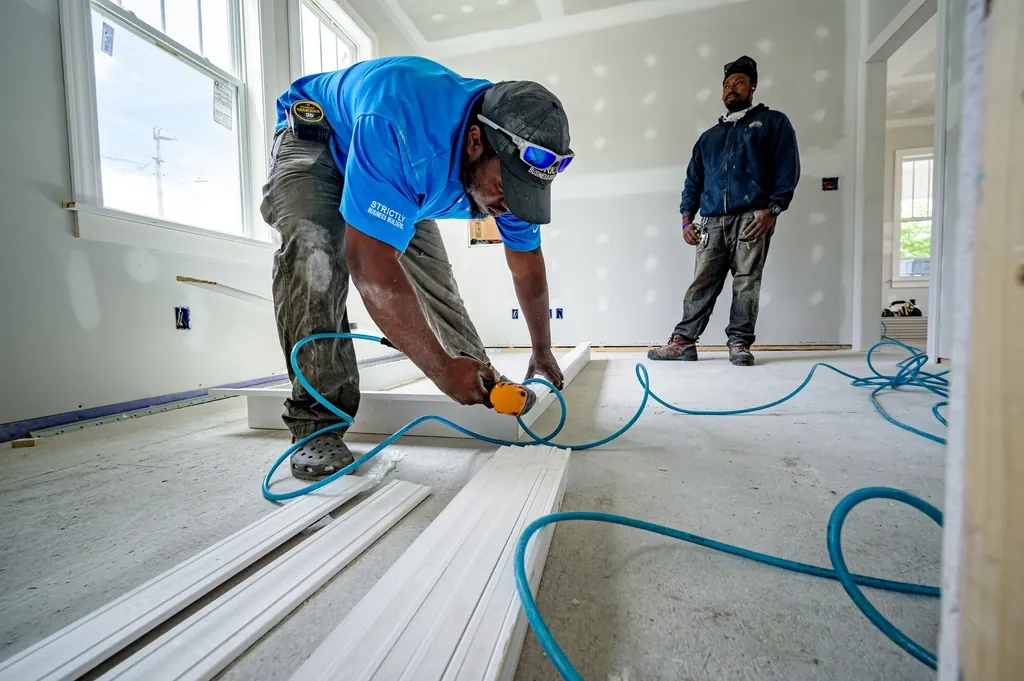 Crew working inside a building interior during a renovation